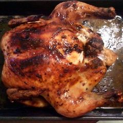 A picture of Garlic butter slathered roasted chicken.