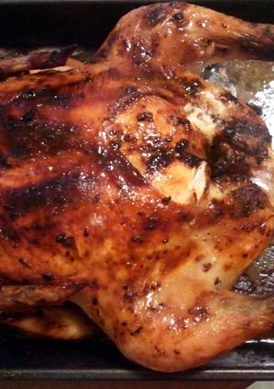 A picture of Garlic butter slathered roasted chicken.