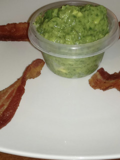 A picture of 🥑Holy moly we have fresh #guacamole and #bacon chips to dip 🥓.