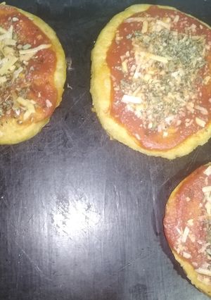 Una foto de Pizzetas fritas