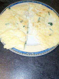 Una foto de Tortilla de mozzarella y albahaca