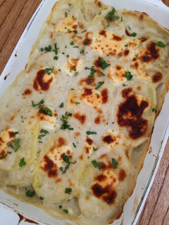 Una foto de Papas gratinadas con salsa blanca