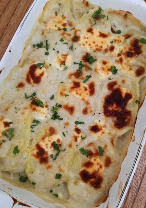 Una foto de Papas gratinadas con salsa blanca