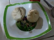 Una foto de dumplings cerdo