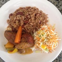 A picture of Brown stew chicken Jamaican style.