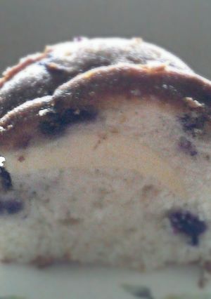 A picture of Lemon- Blueberry Swirl Cake.