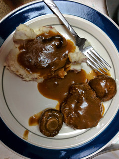 A picture of Salisbury Steak.