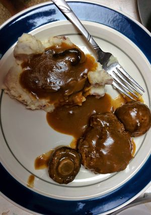 A picture of Salisbury Steak.