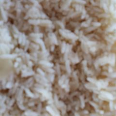 A picture of Mom's Baked Rice w/butter & onions.