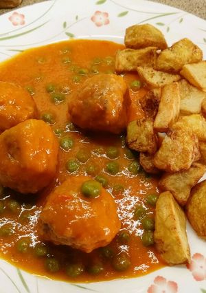 A picture of Meatballs with Vegetable Sauce.