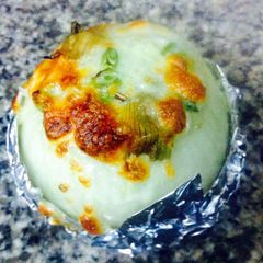 A picture of K's Parmesan Artichoke Stuffed Onion.