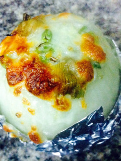 A picture of K's Parmesan Artichoke Stuffed Onion.