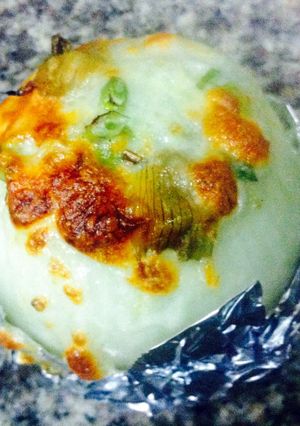 A picture of K's Parmesan Artichoke Stuffed Onion.
