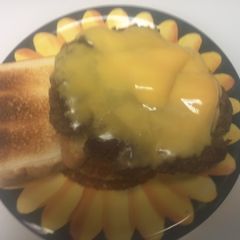 A picture of Moma Burgers wit Texas Toast.