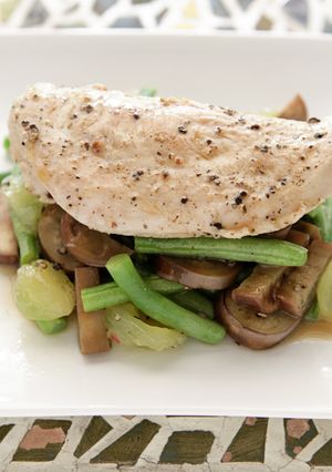 A picture of Pan Seared Chicken with Green Bean, Japanese Eggplant, and Muscadine Sauté.