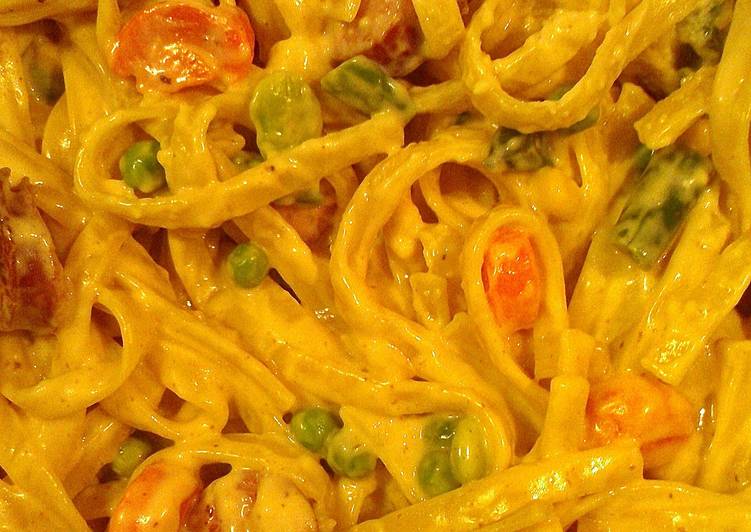 Fettuccine Alfredo with sausage and veggies