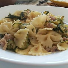A picture of AMIEs Farfalle with Zucchini, Cream & Sausage.