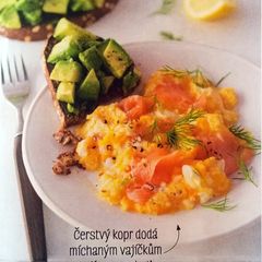 A picture of Scrambled eggs with smoked salmon and avocado toast.