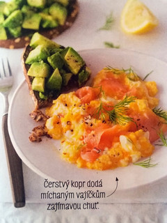 A picture of Scrambled eggs with smoked salmon and avocado toast.
