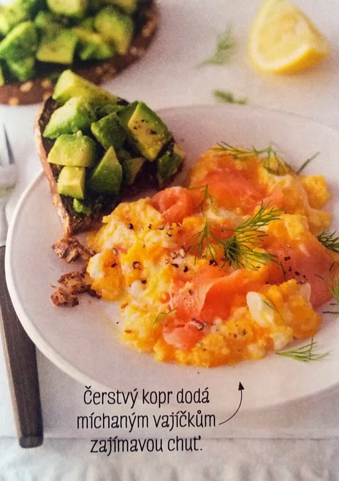 A picture of Scrambled eggs with smoked salmon and avocado toast.