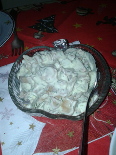 A picture of Mushrooms salad with mayo.