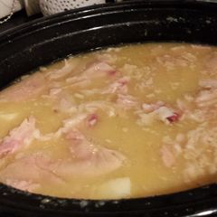 A picture of Red lentil, potato and ham soup.