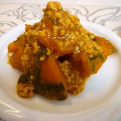 A picture of Simmered Chicken Soboro and Kabocha Squash.