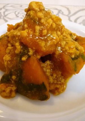A picture of Simmered Chicken Soboro and Kabocha Squash.