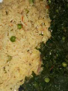 A picture of Vegetable rice served with spinach and peas.