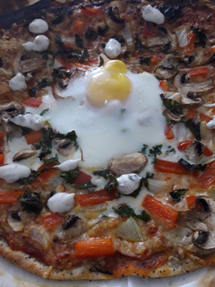 Una foto de Pizza vegetariana