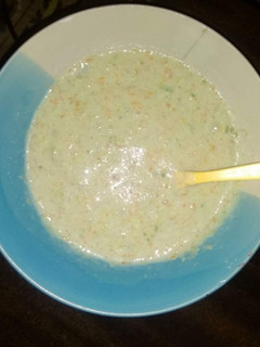 A picture of Rice and carrot puree.