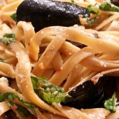 A picture of Fettucine and Mussels in Lemon Garlic Butter Sauce.