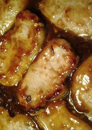 A picture of pork in apricot orange sauce.