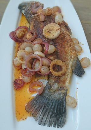 A picture of Fish With Cocktail Onion In Spicy Butter Sauce.