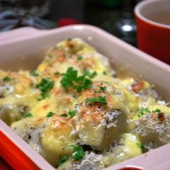 A picture of Piping Hot Taro Root Baked in Cheese.