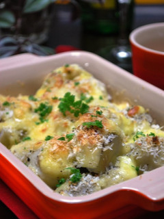 A picture of Piping Hot Taro Root Baked in Cheese.