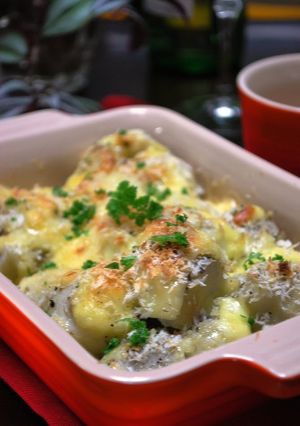 A picture of Piping Hot Taro Root Baked in Cheese.