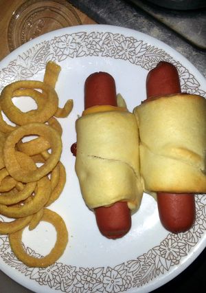 A picture of Jumbo bacon and cheese pigs in a blanket.