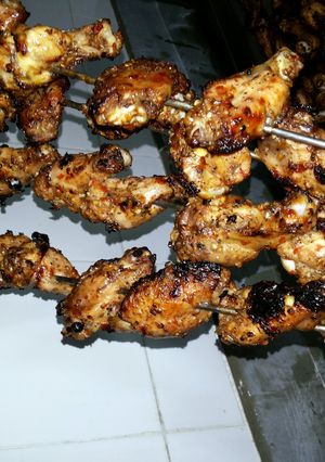 A picture of fire chicken peri peri sweet wings.