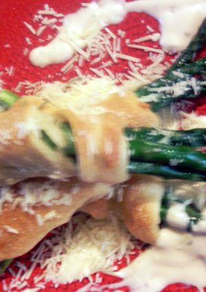 A picture of asparagus in a blanket,with tarragon sause.