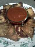 fried ravioli w/ ragu robusto garlic