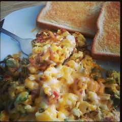 A picture of Cheesy Scrambled eggs.