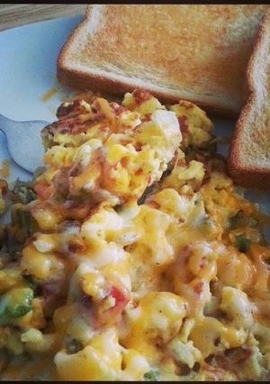 A picture of Cheesy Scrambled eggs.