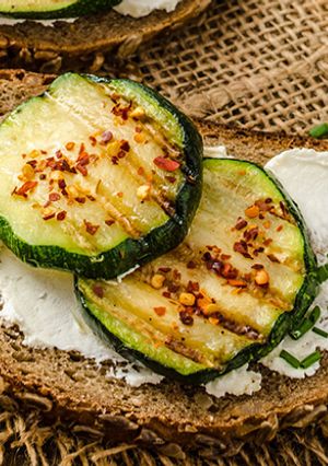 A picture of Sandwich with Mexican Tofu Spread and Grilled Zucchini.