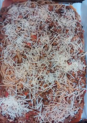 A picture of Baked Spaghetti with Parmesan cheese.