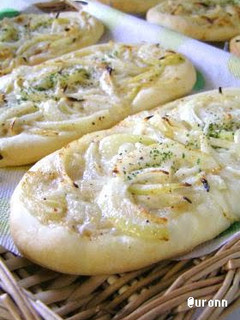 A picture of Tarte Flambé (Baked Onion Flatbread).