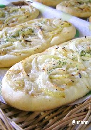 A picture of Tarte Flambé (Baked Onion Flatbread).