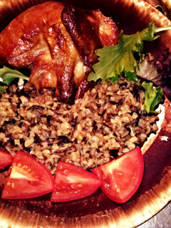 A picture of Cornish Hens with Wild Rice..
