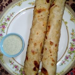 A picture of Chicken tikka roll.
