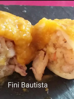 Una foto de Calamares rellenos de arroz y gambas